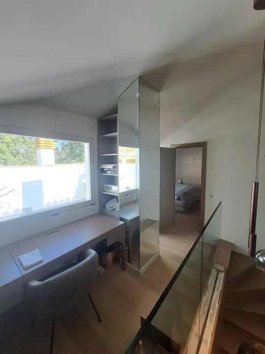 Glass balustrade on a studio mezzanine