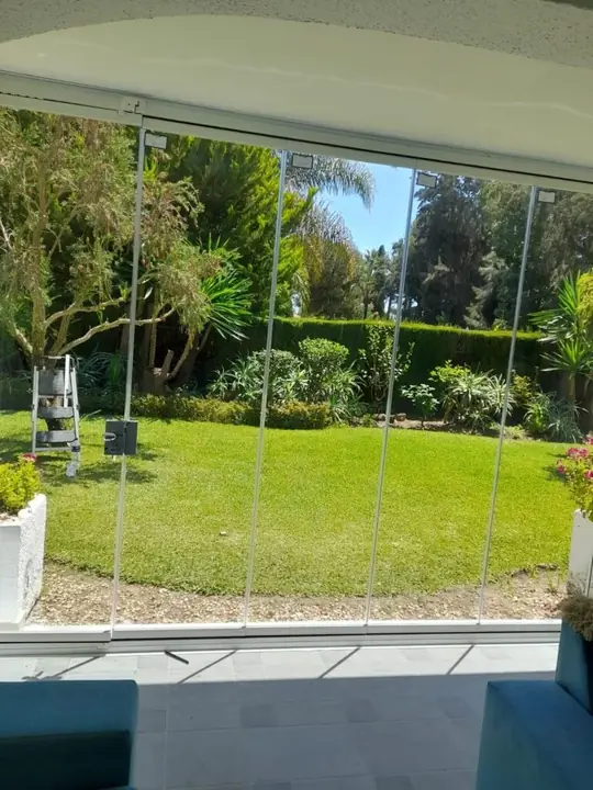 Garden view through panoramic glazing