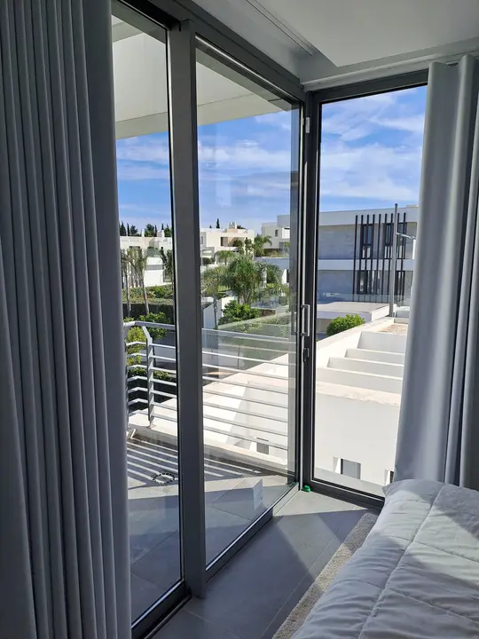 Corner window with black profiles